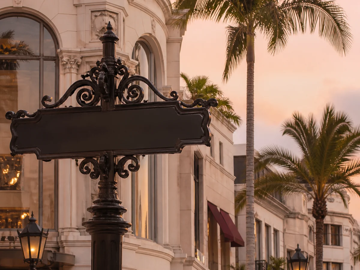 Beverly Hills architecture and palm trees at sunset